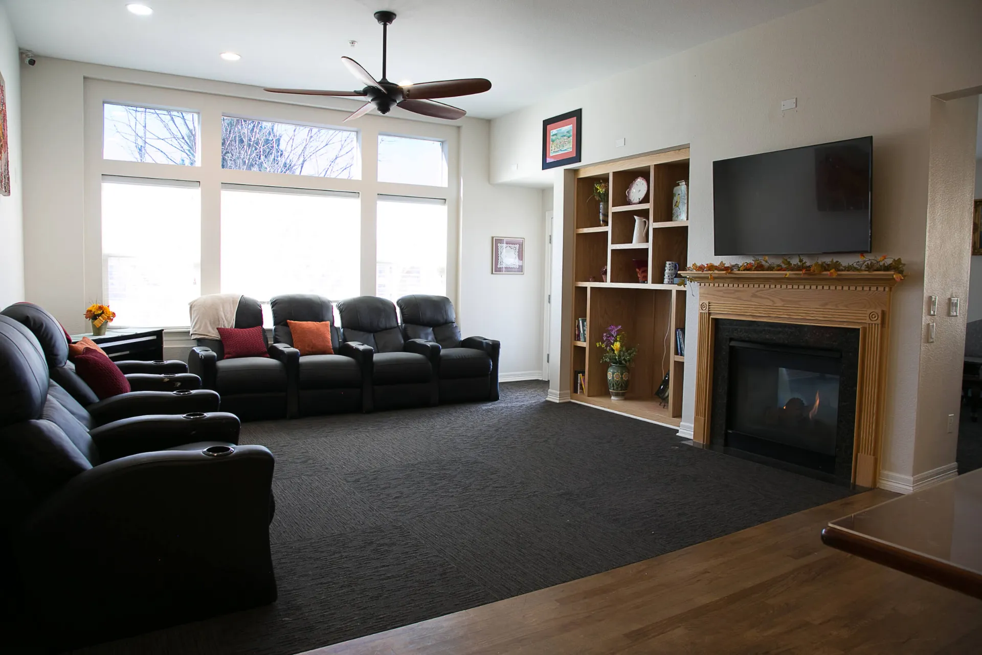 A living room displaying couches and entertainment system.
